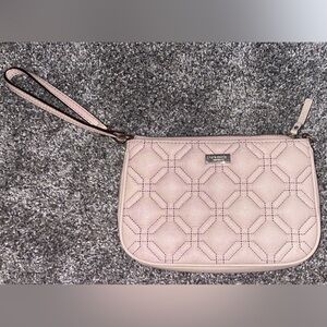 Kate Spade New York blush pink leather purse bag with gold detailing.
